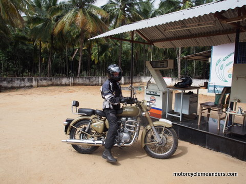 Oskar on the bike at petrol stop along the way